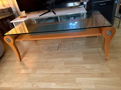 Elegant Glass-Top Coffee Table with Wooden Legs