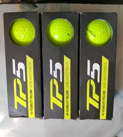 Set of 3 TaylorMade TP5 golf balls in high-visibility yellow.