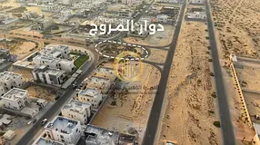 Residential land for sale in Al-Hawshi, prime location near Al-Muruj roundabout and Al-Jisr Street.