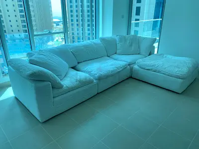 Cloud feather filled The Loom Collection Sofa with footstool