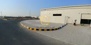 Warehouses for sale in Al-Sajaa Industrial Area Block 2, corner on two streets, 36 meters. Land area