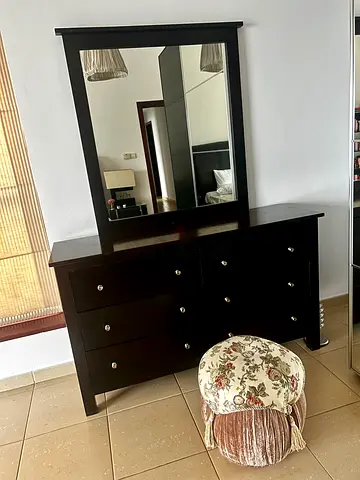 Elegant Dark Wood Dresser with Mirror and Cozy Pouf