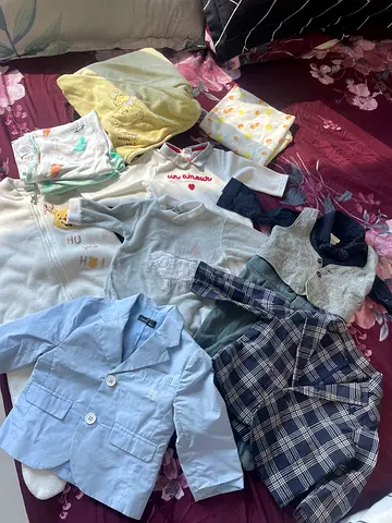 Branded Baby clothes with 2 jackets AED 100