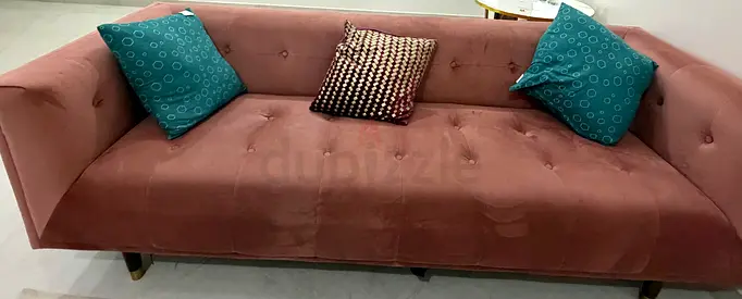 Stylish Velvet Sofa in Dusty Pink with Decorative Cushions