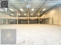 A giant warehouse suitable for all commercial activities, with a large parking area in front.
