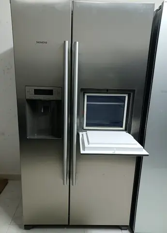 Siemens iq500 side by side refrigerator with water depanser and ice maker with mini bar