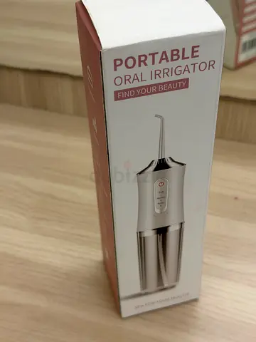 Portable Oral Irrigator for a Bright Smile