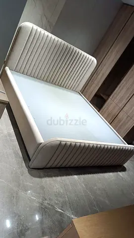 Stylish Upholstered King Size Bed with Unique Design