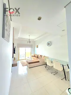 One-bedroom apartment for sale in Emirates City, fully furnished to a high standard, in a prestigiou