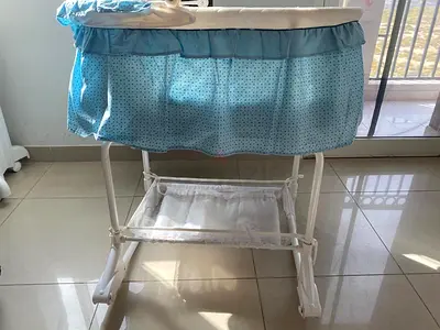 Gentle Blue Bassinet for Your Baby