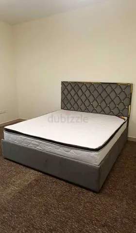 Elegant Grey Bed Frame with Stylish Headboard