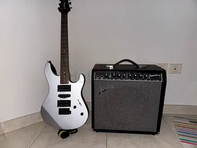 Yamaha guitar and a fender amplifier (bundle)
