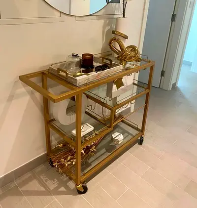 Elegant Gold Shelving Unit for Entertaining