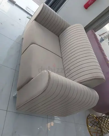 Stylish Cream Sofa with Modern Ribbed Design