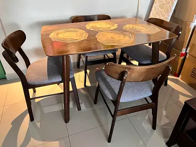 Elegant Dining Table Set with Stylish Rose Design