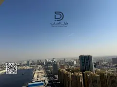 Own a Two-Bedroom Apartment with Living Room in Al Waha Towers, Featuring a Prime Strategic Location