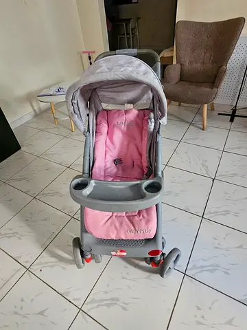 Lightly Used Baby Stroller in Pink and Grey