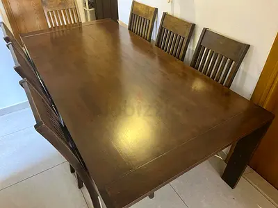 Solid wood Royal Furniture 8-chair Dinning Table with Chairs for urgent sale, leaving the country.