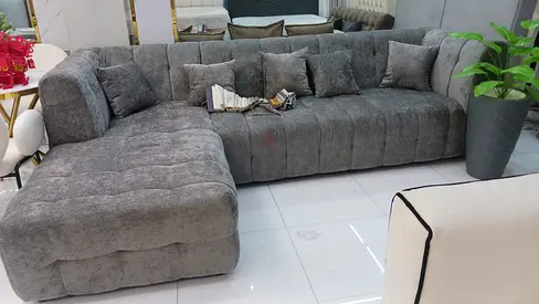 Comfortable L-Shaped Grey Sofa with Cushions