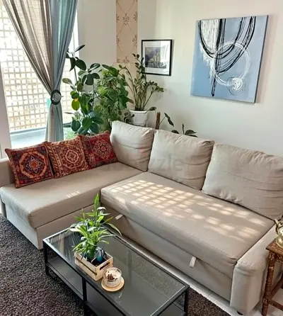 Modern Beige Sectional Sofa bed with Decorative Pillows