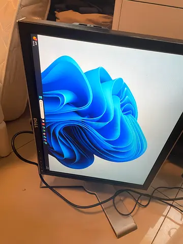 Dell Monitor, 90 degree rotation and height adjustable, Sleek Design works with VGA cable