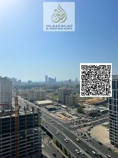 For rent in Ajman, Al Nuaimiya 1: One-bedroom apartment with a separate living room, balcony, built-