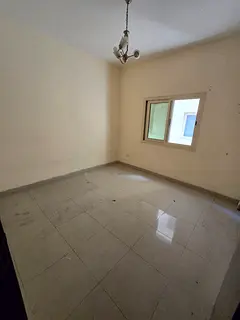 A large apartment with one bedroom and a living room, a separate living area, central air conditioni