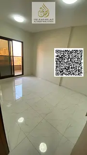 For rent in Ajman, Al Rawda 1, near Al Hamidiya Police Station: a one-bedroom apartment with a livin
