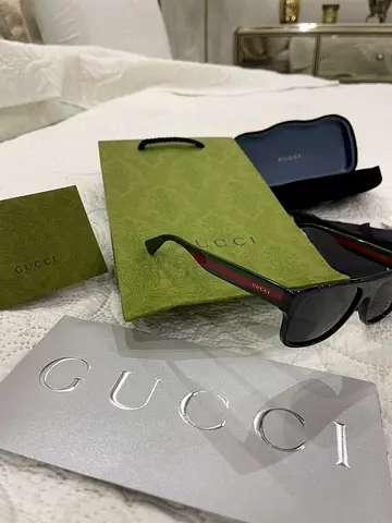 Gucci acetate sunglasses bought from Dubai mall with box and everything 1300 negotiable