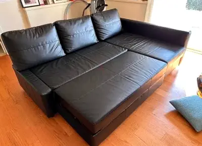Comfortable Black Leather Sofa with Chaise