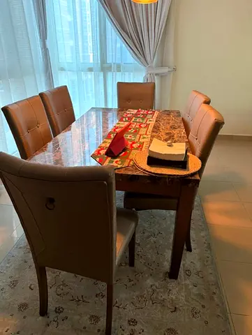 Elegant Dining Table Set with Plush Chairs