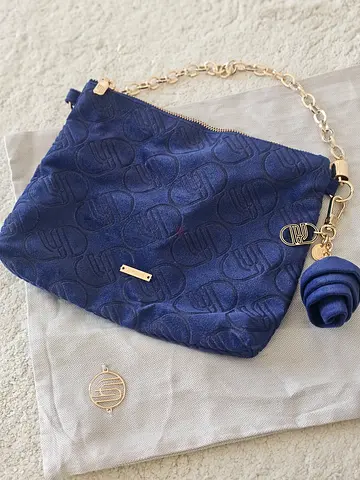 Stylish Blue Handbag with Gold Accents