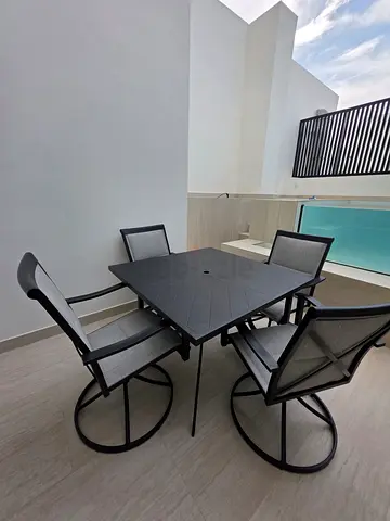 Outdoor Dinning Table and 4 Swivel Chairs