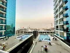 Furnished 2-bedroom apartment for monthly rent in Al Waha Towers, Al Rashidiya. Spacious layout, ful