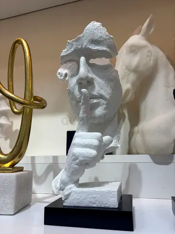 Modern Whispering Statue