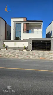Modern villa for sale, freehold, on a main street, near the Tribes Center, Ambassador Mall, Sheikh M