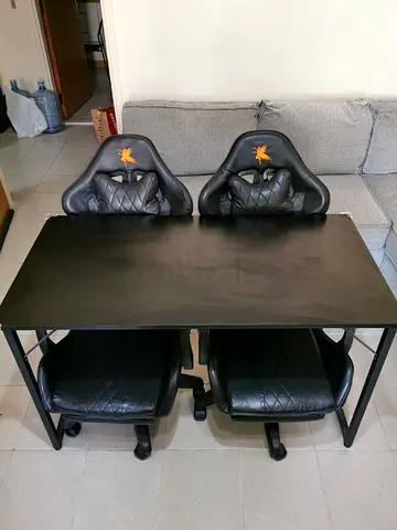 Stylish Black Gaming Desk with Dual Chairs