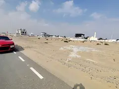 Rare Investment Opportunity – Prime Adjoining Plots for Sale in Al Muzairah