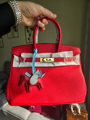 Hermes Red Handbag - Elegant and Timeless