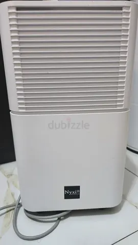 Compact and Efficient Dehumidifier 12L by Nyxi