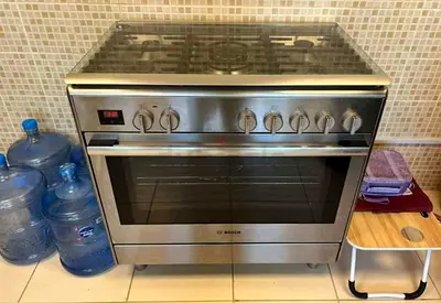 Bosch stainless steel gas / electric combination cooking range series8 almost new