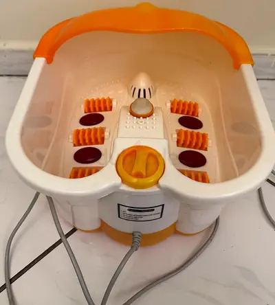 Multi-functional foot bath massager