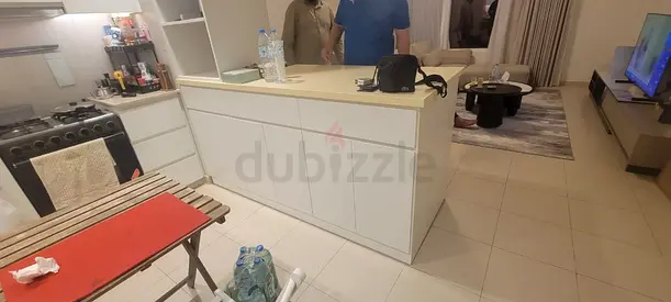 Modern White Kitchen Island with Bar Seating
