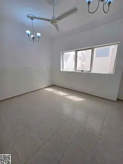 Two bedrooms, a living room, two bathrooms, and a balcony in Al Nuaimiya 1, on Al Ittihad Street, ne