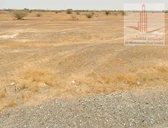Two adjacent residential/commercial plots of land, each measuring 5000 square feet, for sale at an e