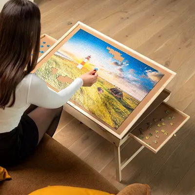 Puzzle table with folding legs