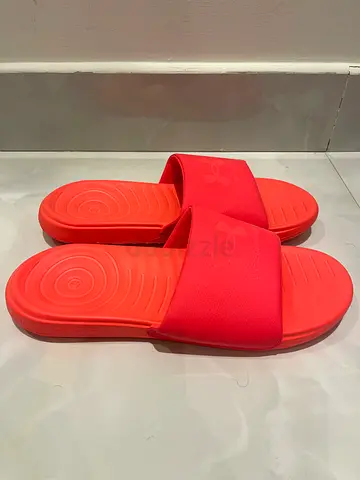 Neon pink Under Armour Slide Sandals