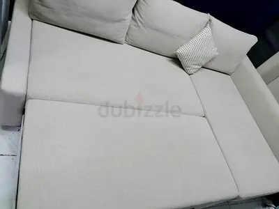 Comfortable Beige Sectional Sofa with Accent Pillow