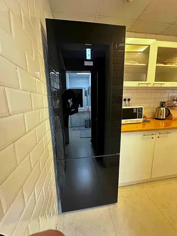 Siemens black glass door fridge with bottom freezer