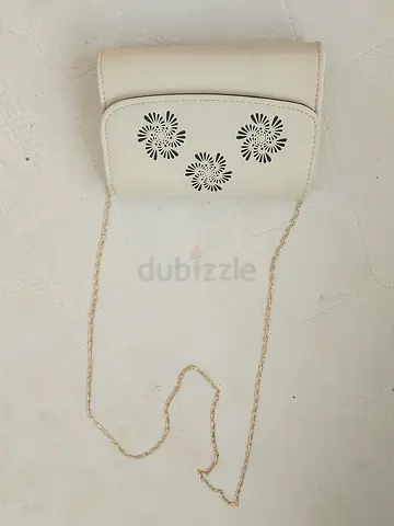 Elegant White Crossbody Bag with Floral Design
